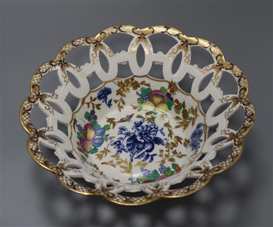 A Worcester blue and white printed and polychrome painted cake basket (a.f.)